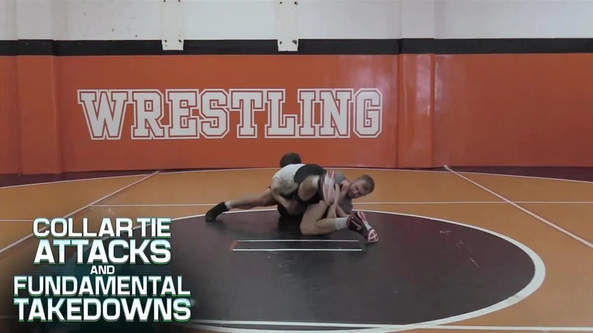 Collar Tie Attacks and Fundamental Takedowns by Dustin Schlatter